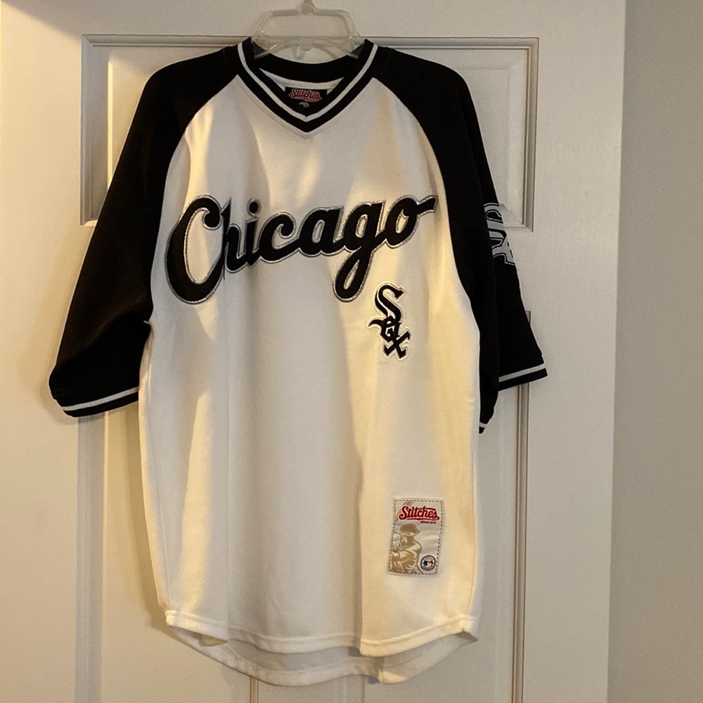 Never worn Chicago White Sox shirt with embroidered patches.